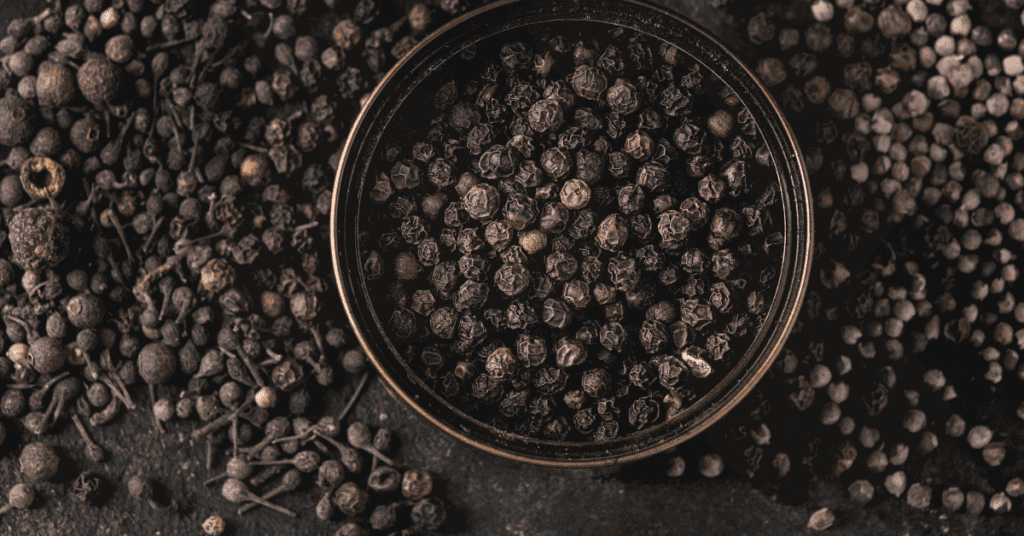 black peppercorns in bowl