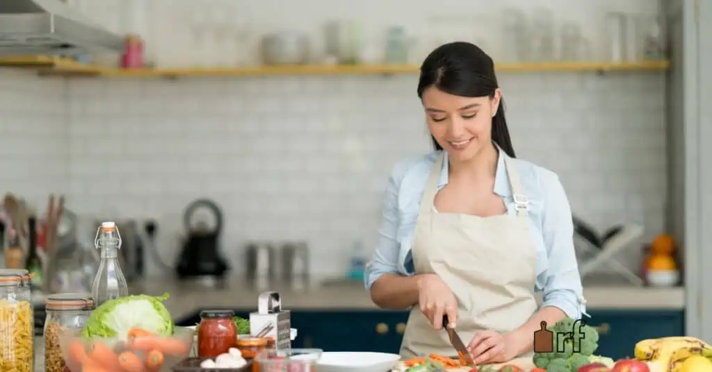 woman prepping food in kitchen