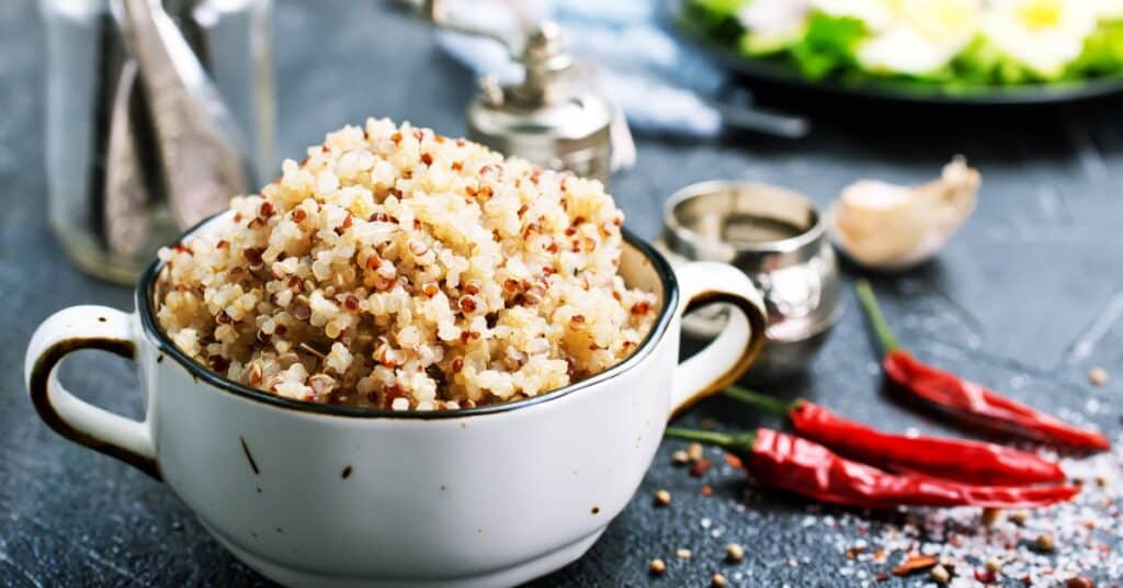 cooked quinoa breakfast bowl with spices