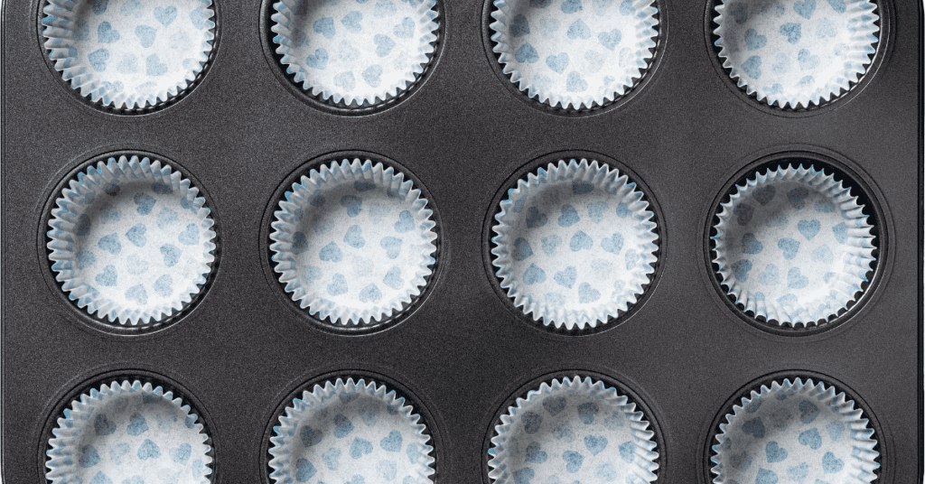 muffin pan with blue heart cup liners