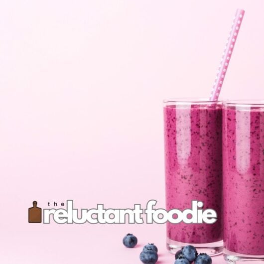 wild blueberry dragon fruit smoothie with straw