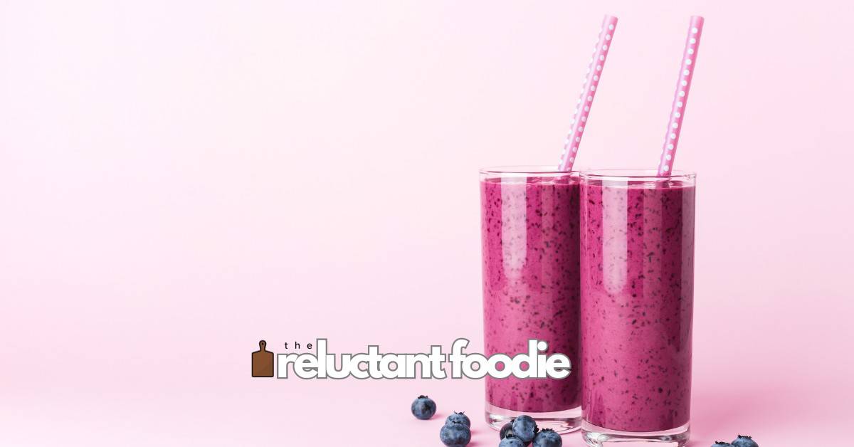 wild blueberry dragon fruit smoothie with straw